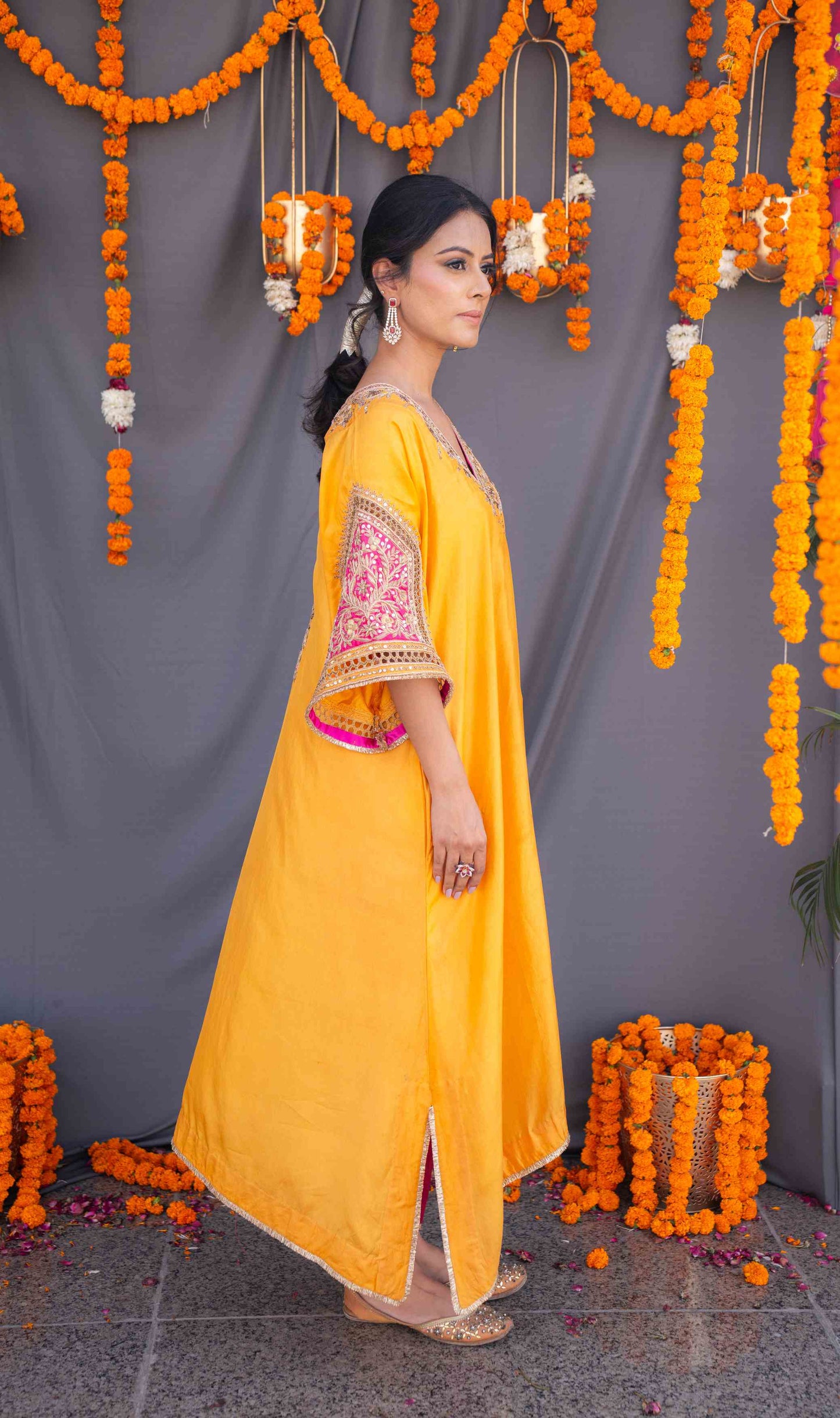 Yellow kaftaan with magenta pants and dupatta