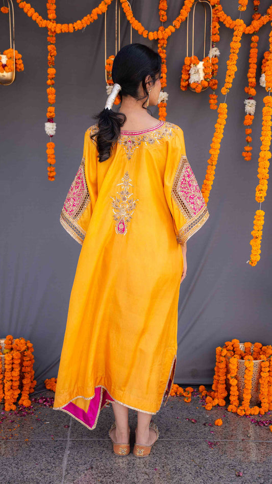 Yellow kaftaan with magenta pants and dupatta