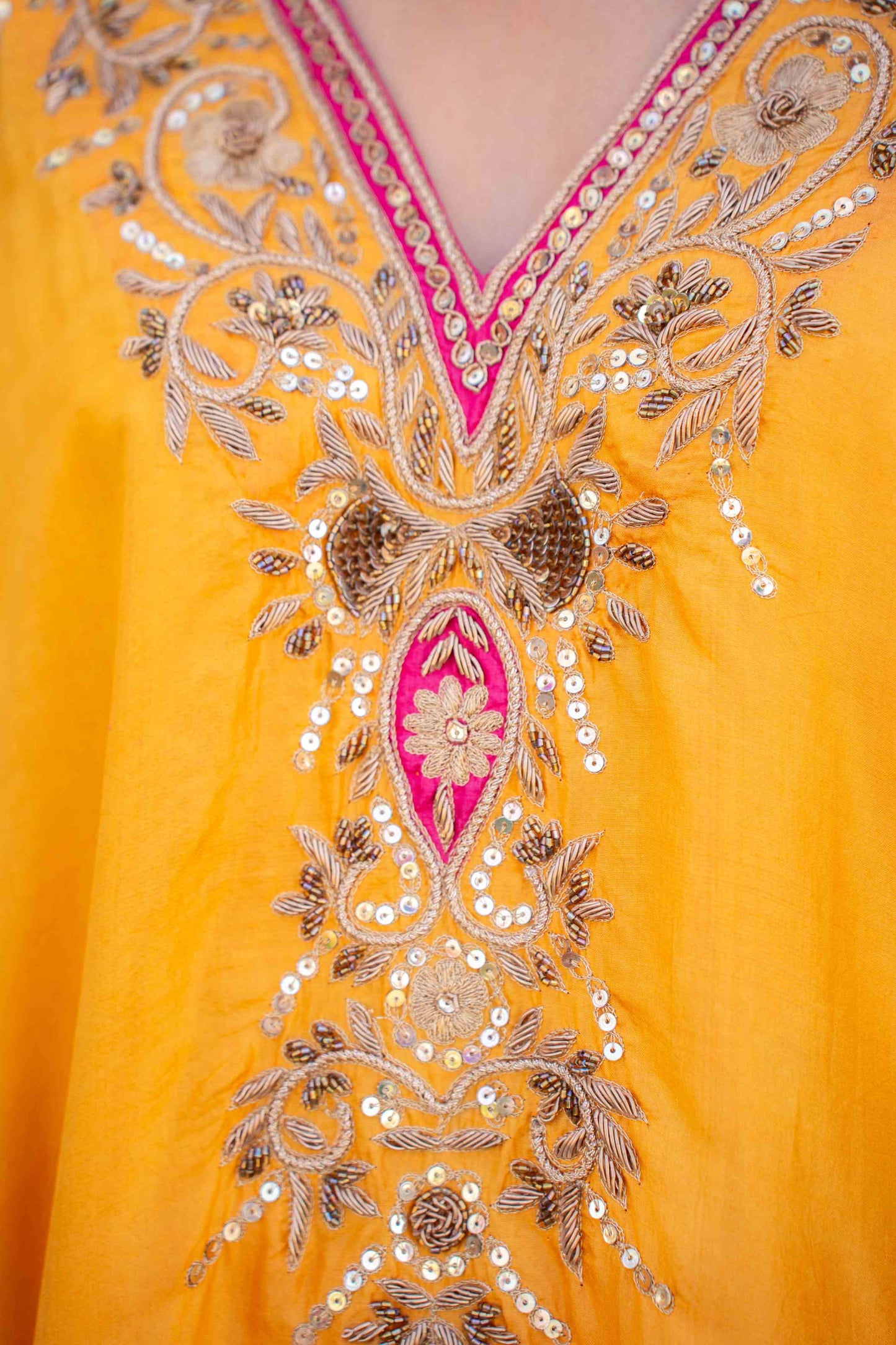Yellow kaftaan with magenta pants and dupatta