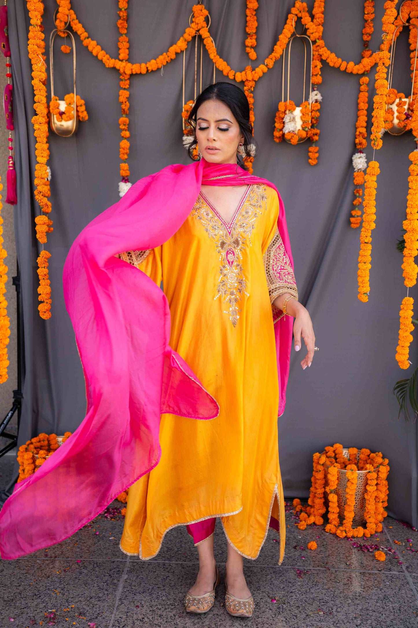Yellow kaftaan with magenta pants and dupatta
