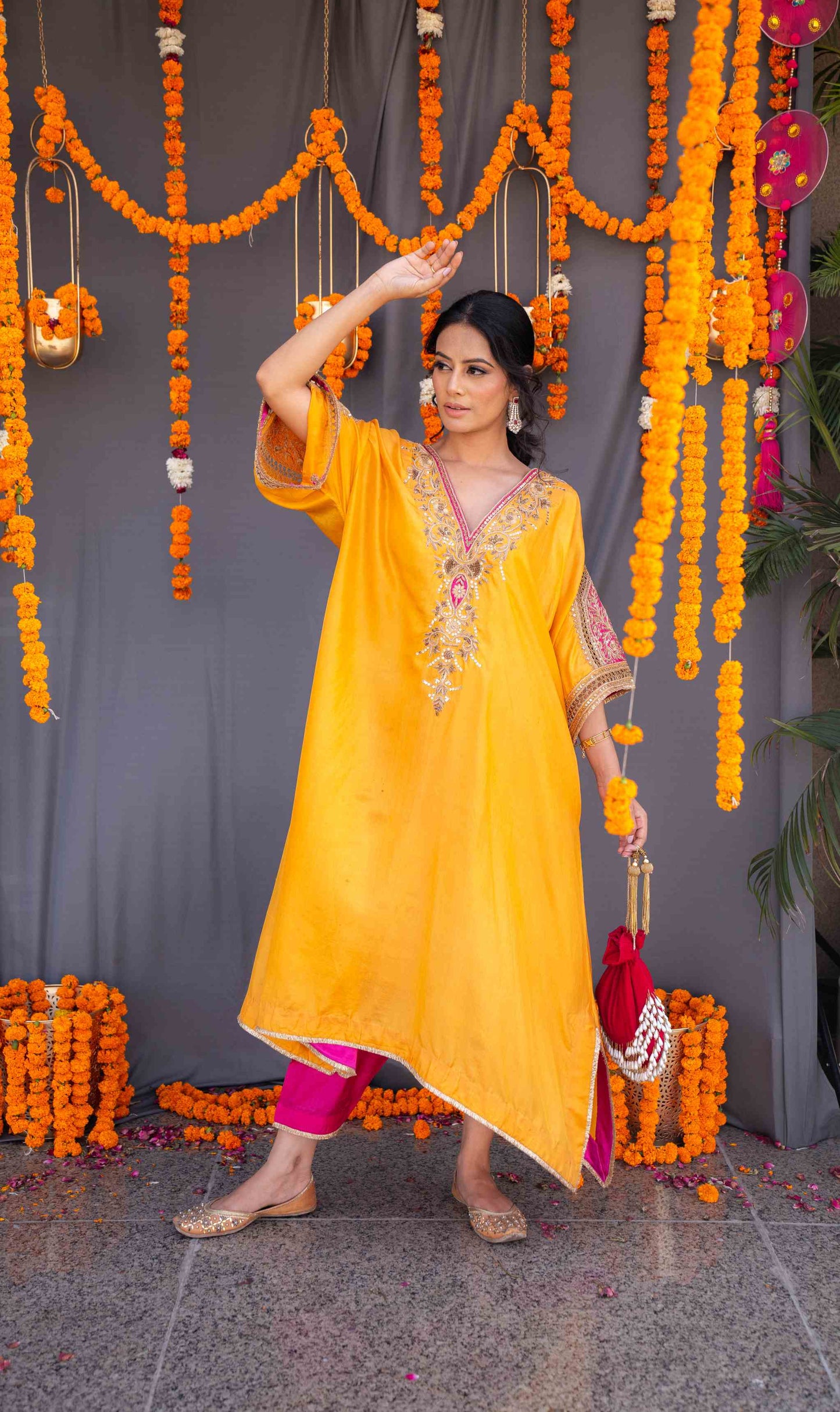 Yellow kaftaan with magenta pants and dupatta