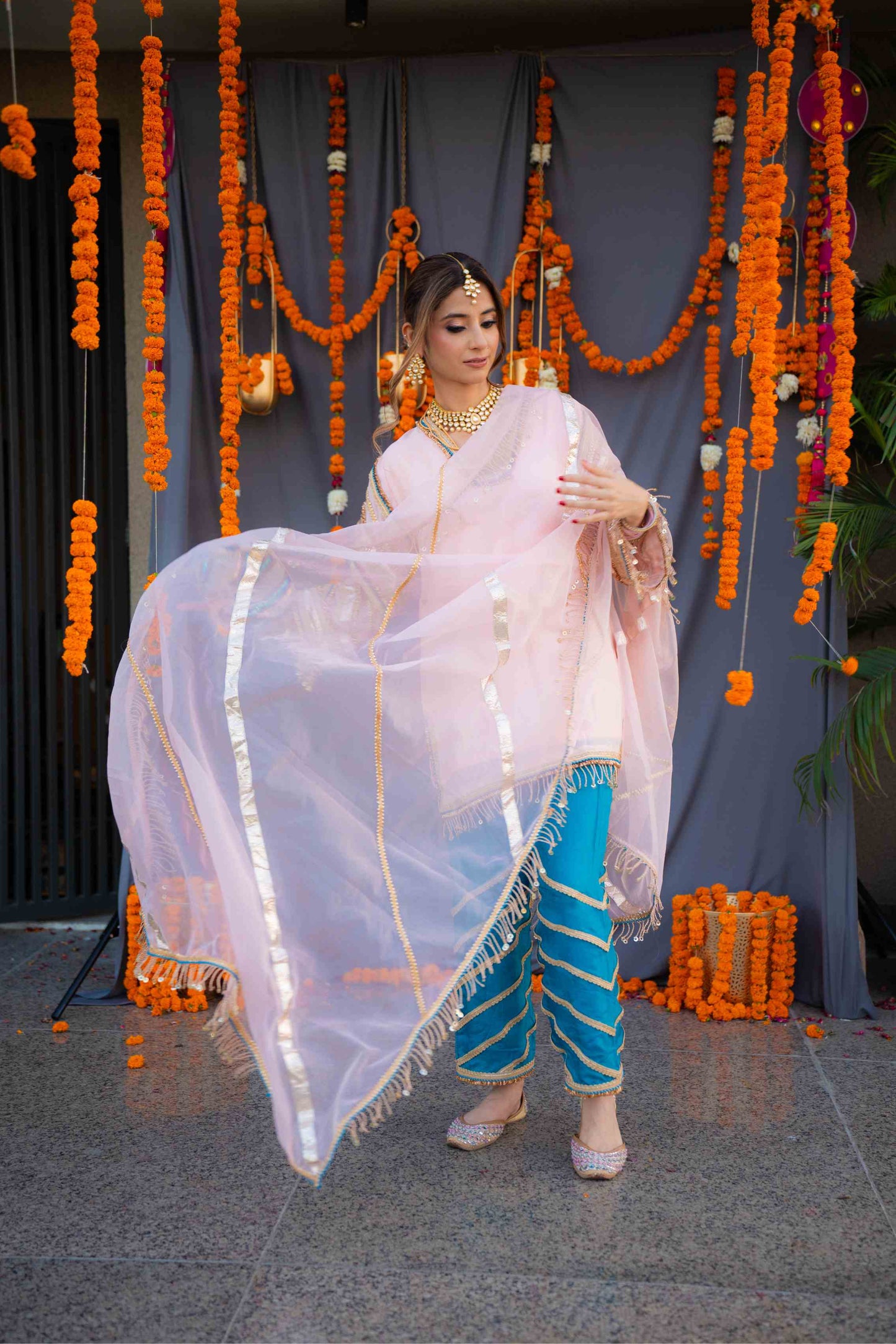 Rosegold shirt with blue pants and organza dupatta
