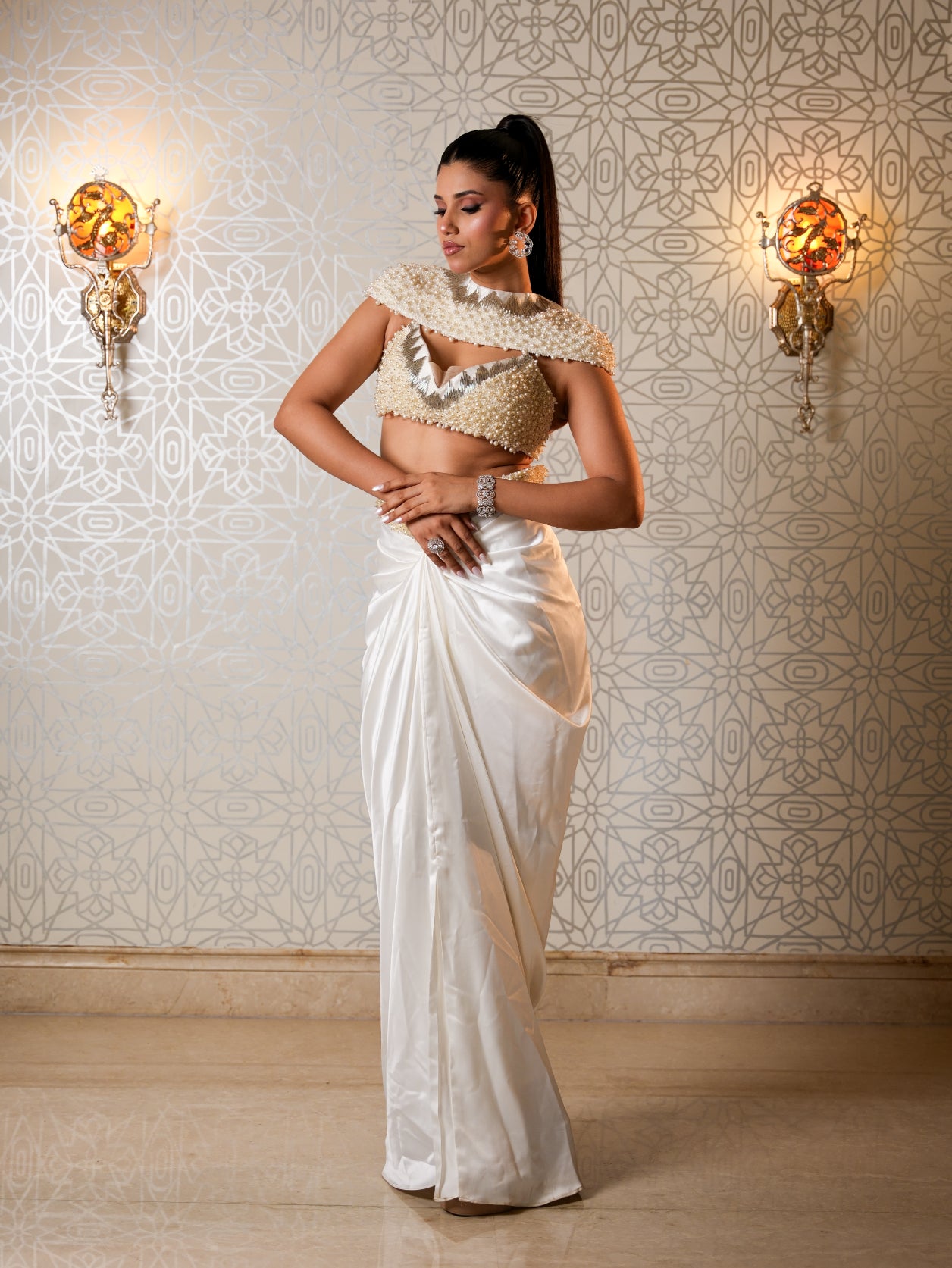 White Pearl Bustier Top With Drape Skirt And Emeroidered Short Cape.