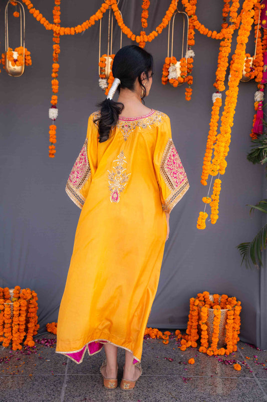 Yellow kaftaan with magenta pants and dupatta