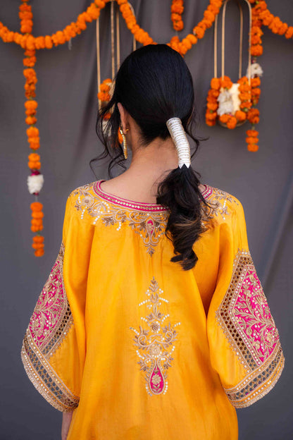 Yellow kaftaan with magenta pants and dupatta