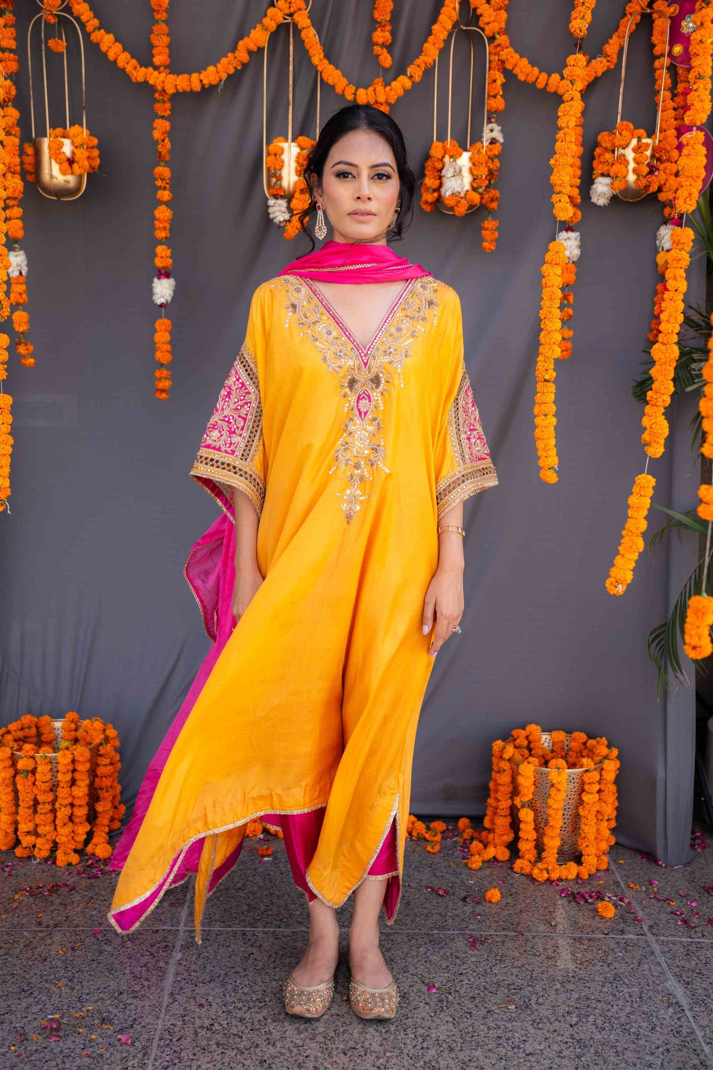 Yellow kaftaan with magenta pants and dupatta