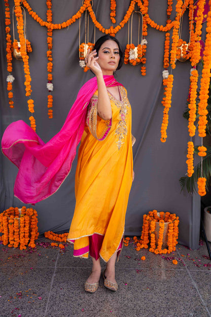 Yellow kaftaan with magenta pants and dupatta