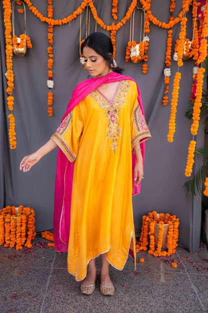 Yellow kaftaan with magenta pants and dupatta