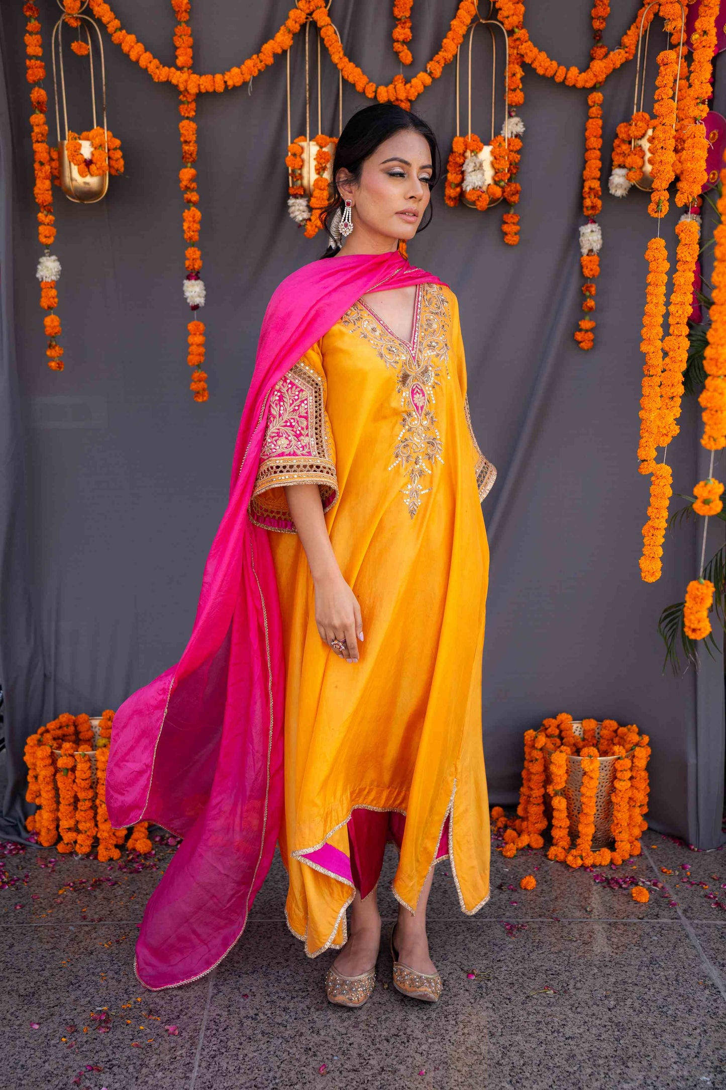 Yellow kaftaan with magenta pants and dupatta