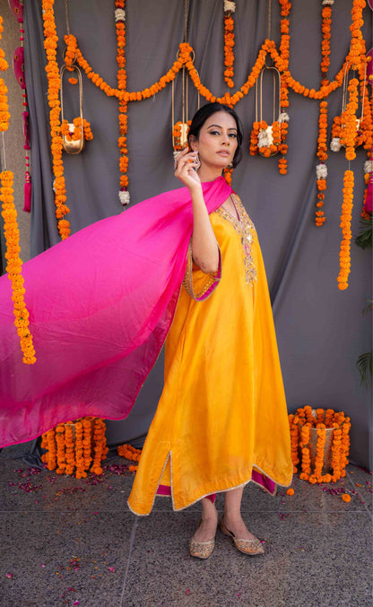 Yellow kaftaan with magenta pants and dupatta