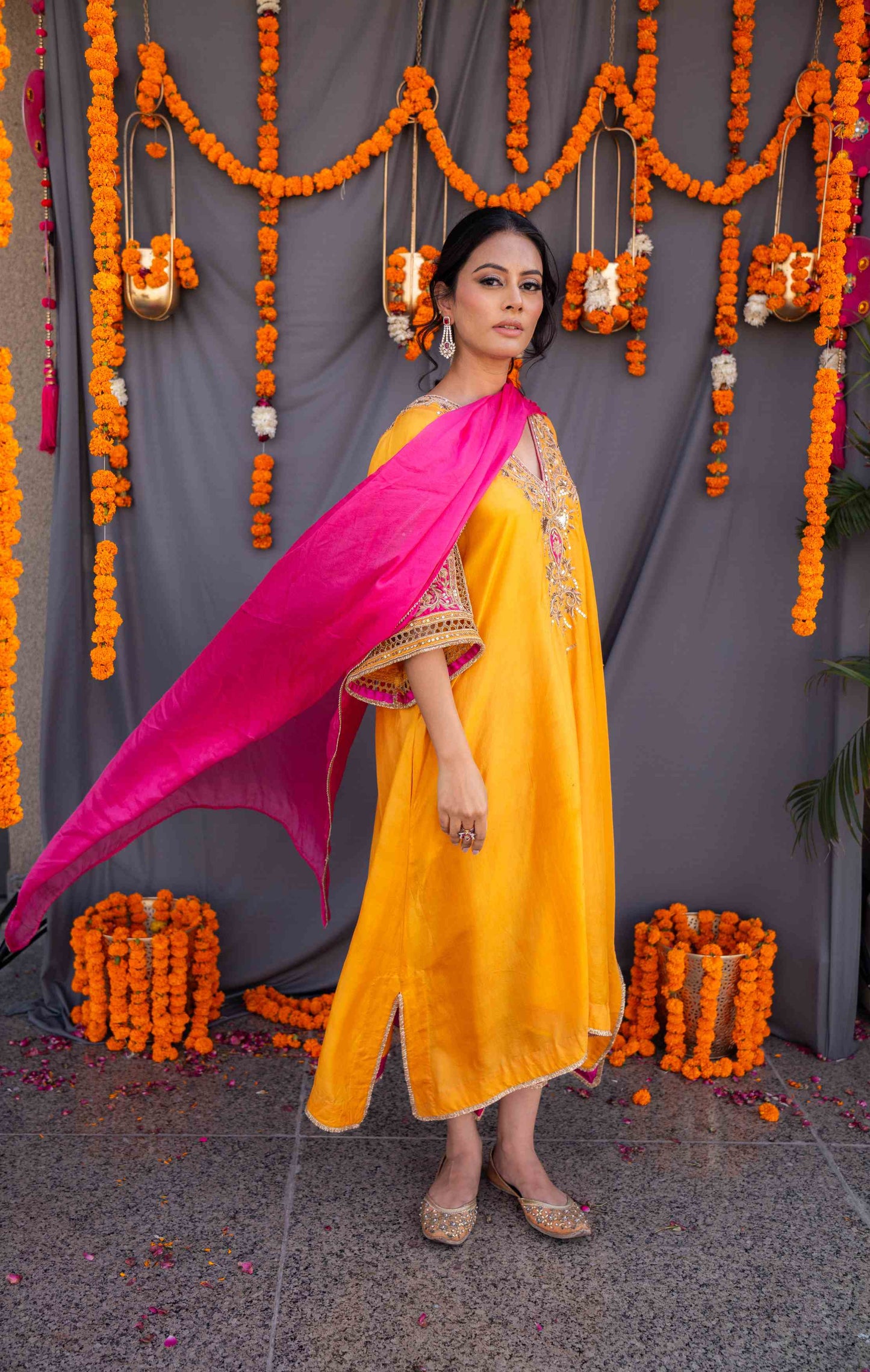 Yellow kaftaan with magenta pants and dupatta