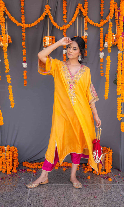 Yellow kaftaan with magenta pants and dupatta