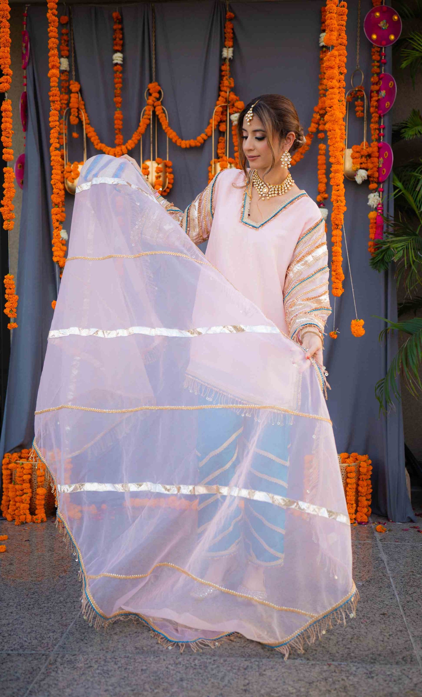 Rosegold shirt with blue pants and organza dupatta