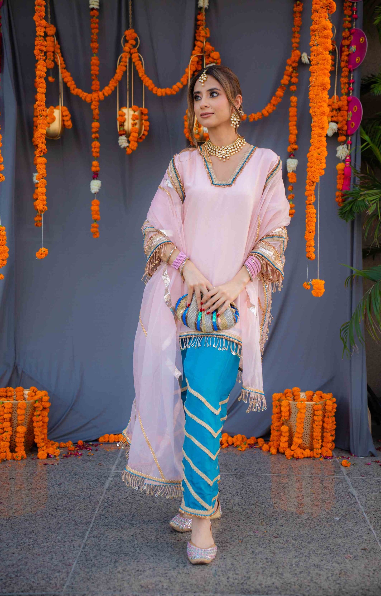 Rosegold shirt with blue pants and organza dupatta