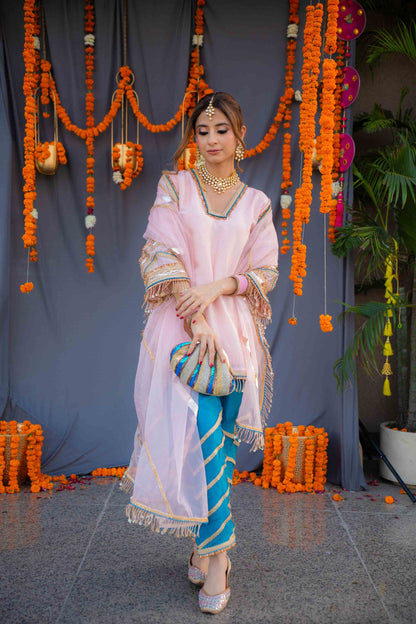 Rosegold shirt with blue pants and organza dupatta