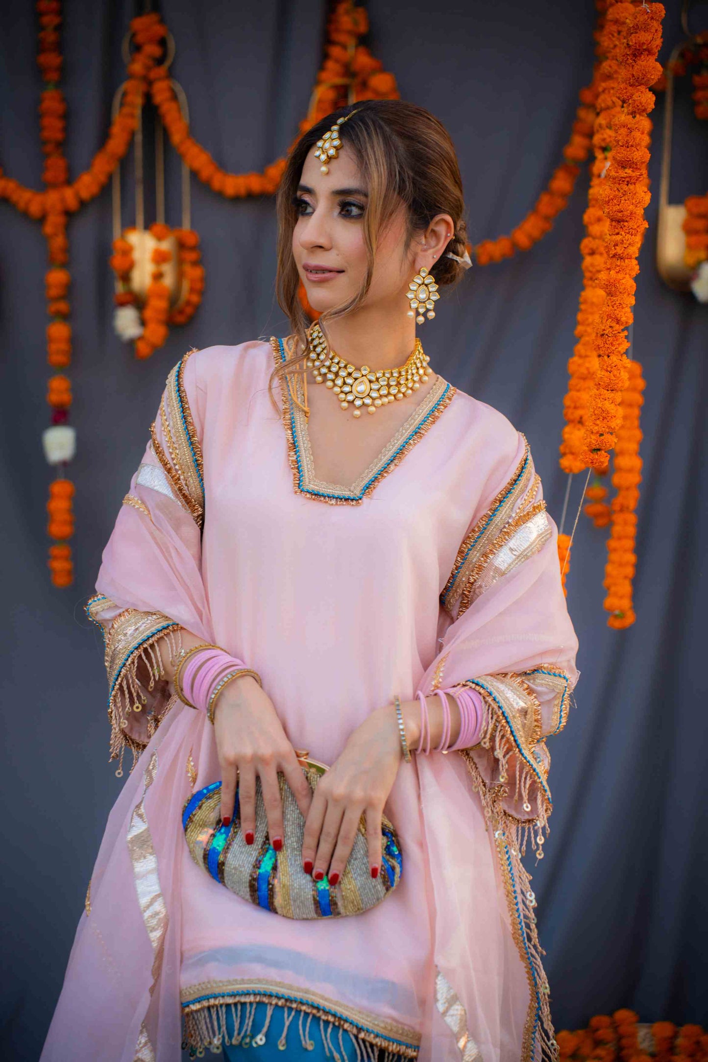 Rosegold shirt with blue pants and organza dupatta