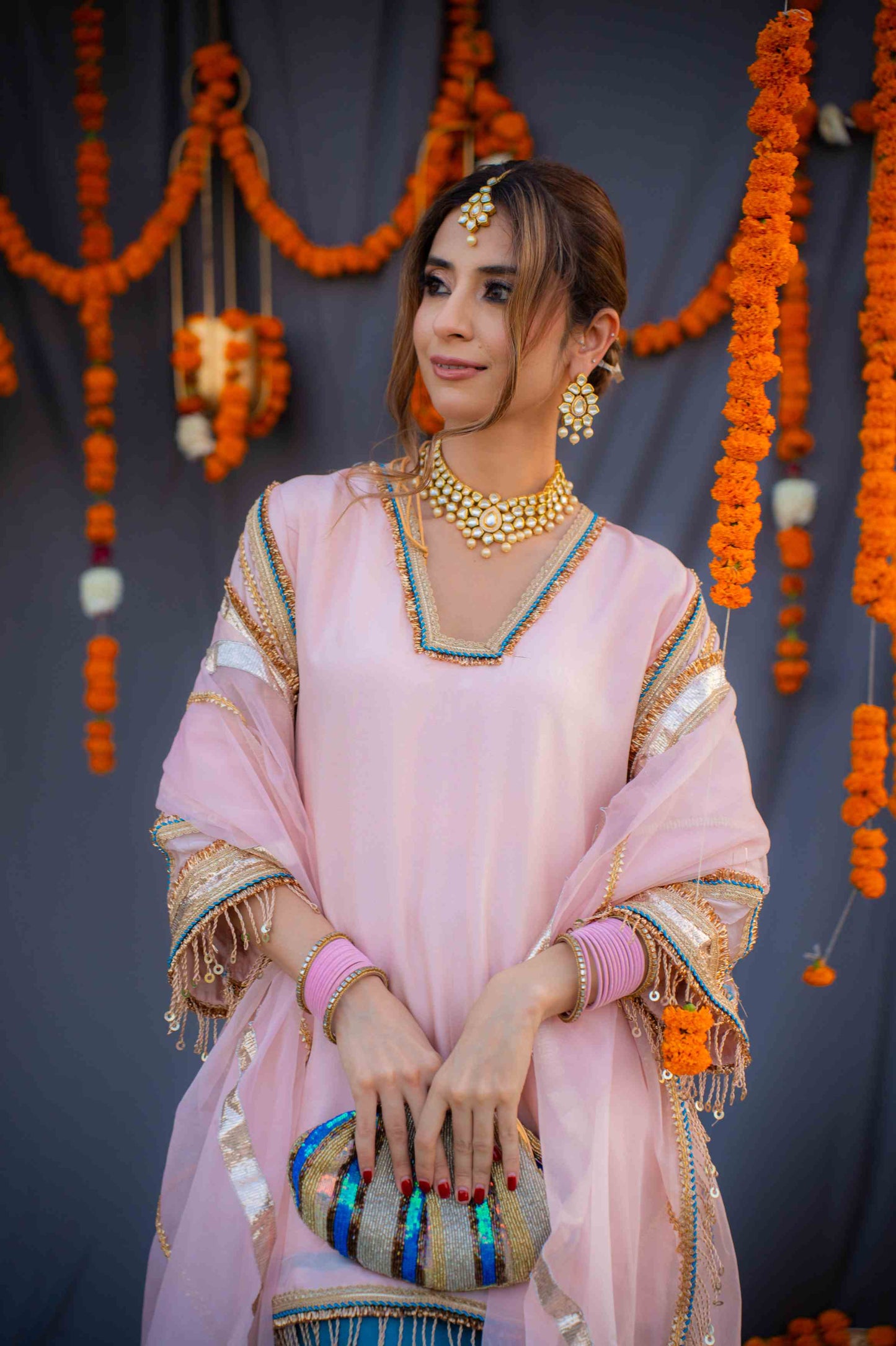 Rosegold shirt with blue pants and organza dupatta