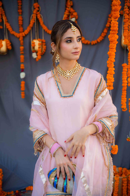 Rosegold shirt with blue pants and organza dupatta