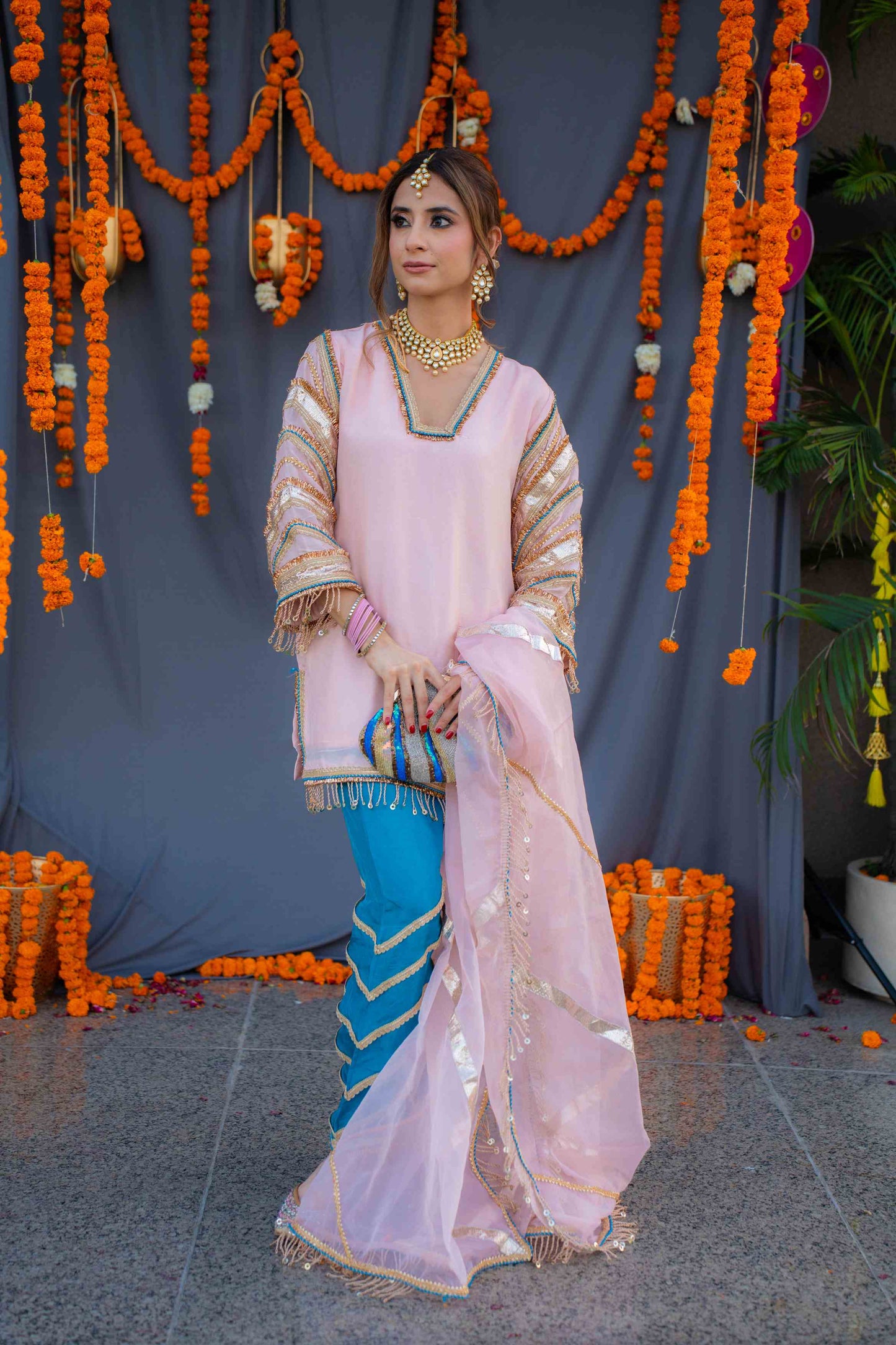 Rosegold shirt with blue pants and organza dupatta